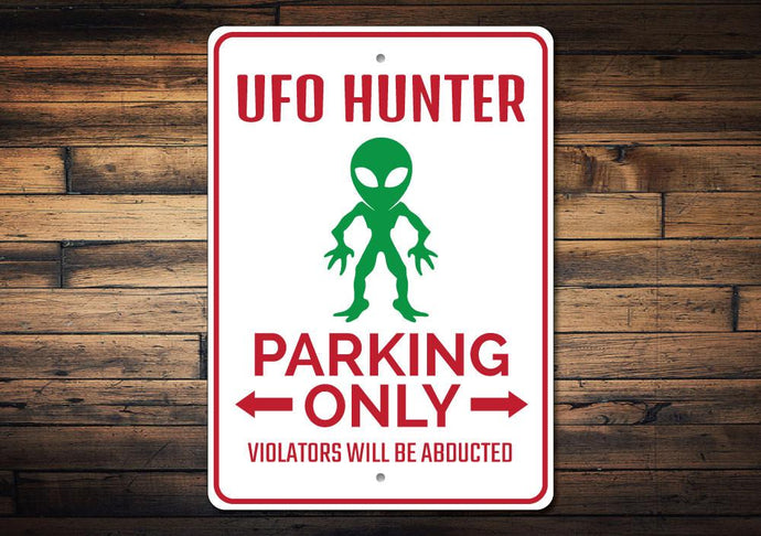 UFO Hunter Parking Sign Wood Background